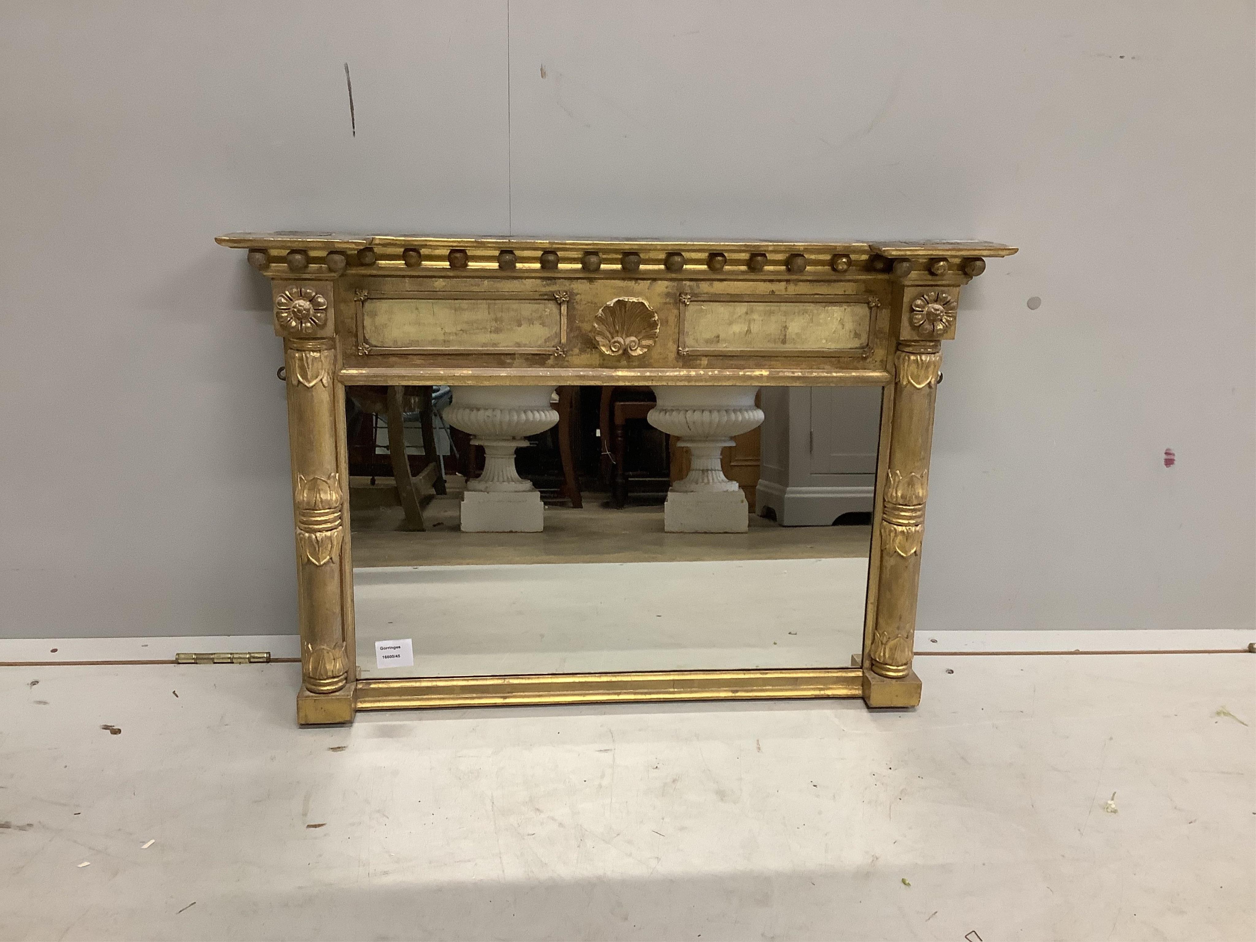 A small Regency giltwood and composition overmantel mirror, width 78cm, height 53cm. Condition - fair to good